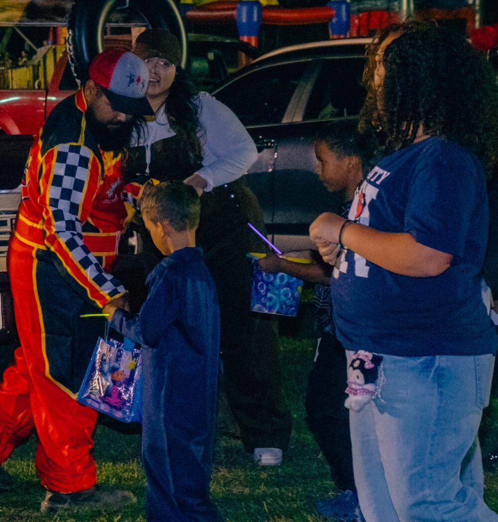 volunteers serving at Trunk or Treat
